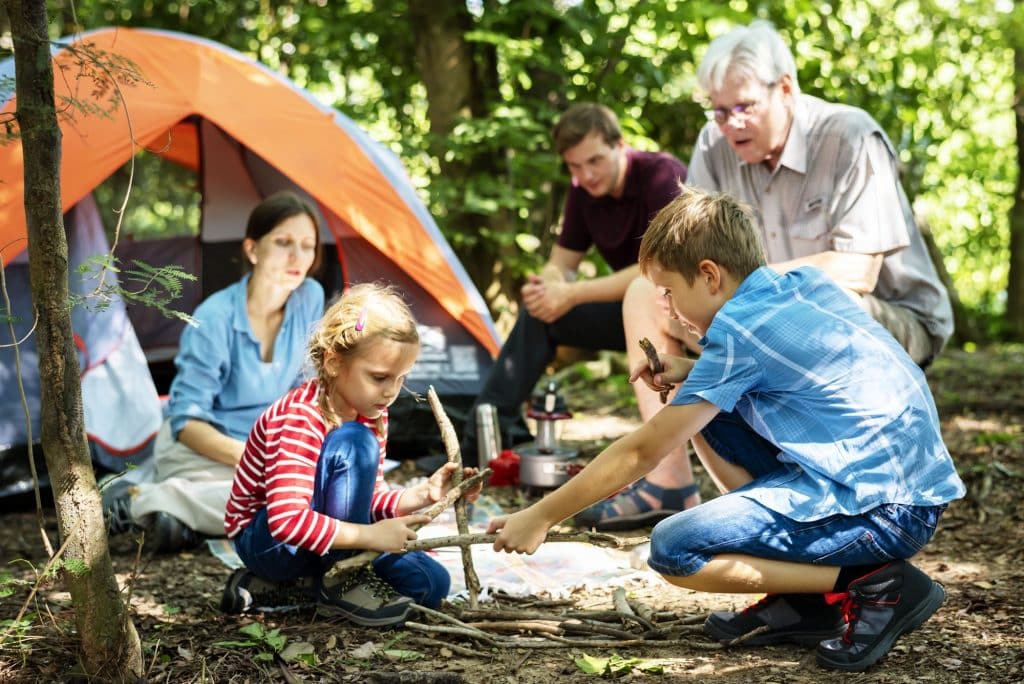 Family camping in the forest