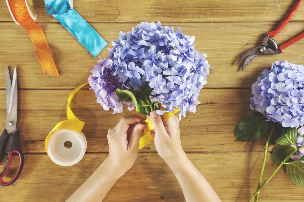 What is floristry? Floristry is the production and trade of flowers and is most commonly associated with beautifully arranged displays of flowers.
