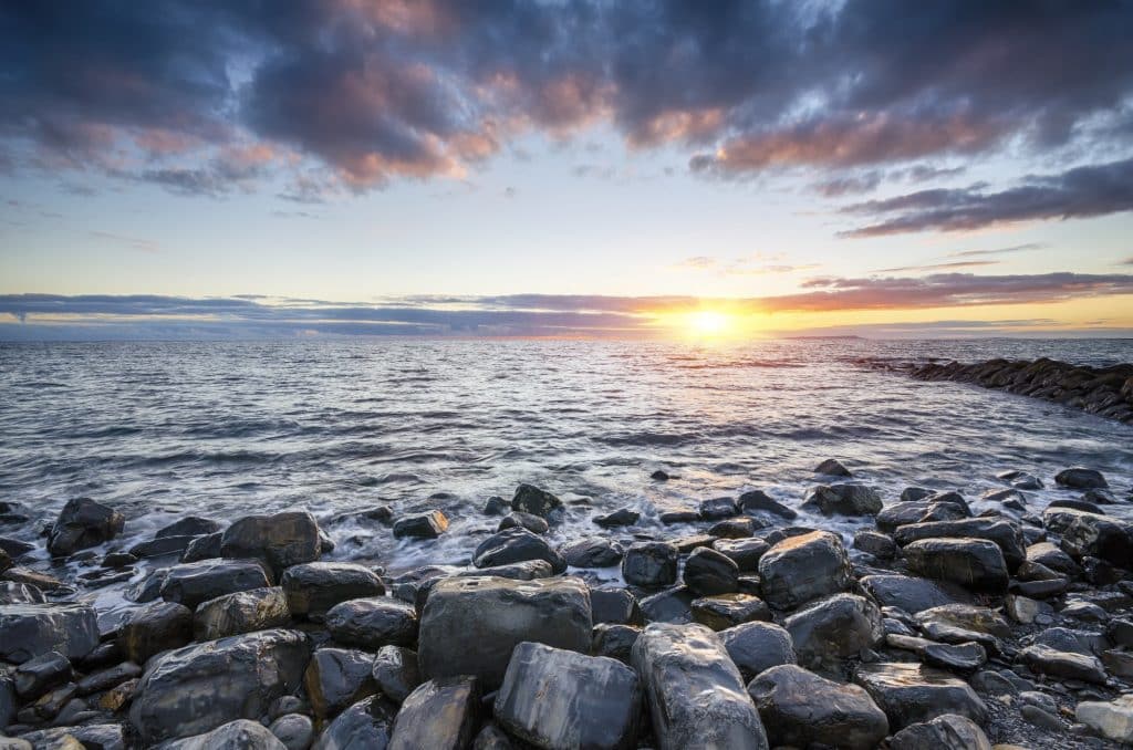 Sea glass turns what used to be garbage and turns it into polished pieces to be used in crafts. Learn how to get started with sea glass hunting today! (Sunset at Kimmeridge Beach)