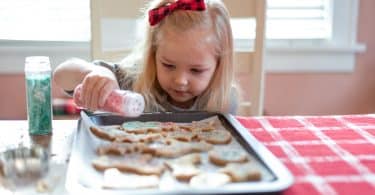 Done-for-you Christmas cookie decorating kits are a great way to keep the kids entertained over winter break and for family gatherings.