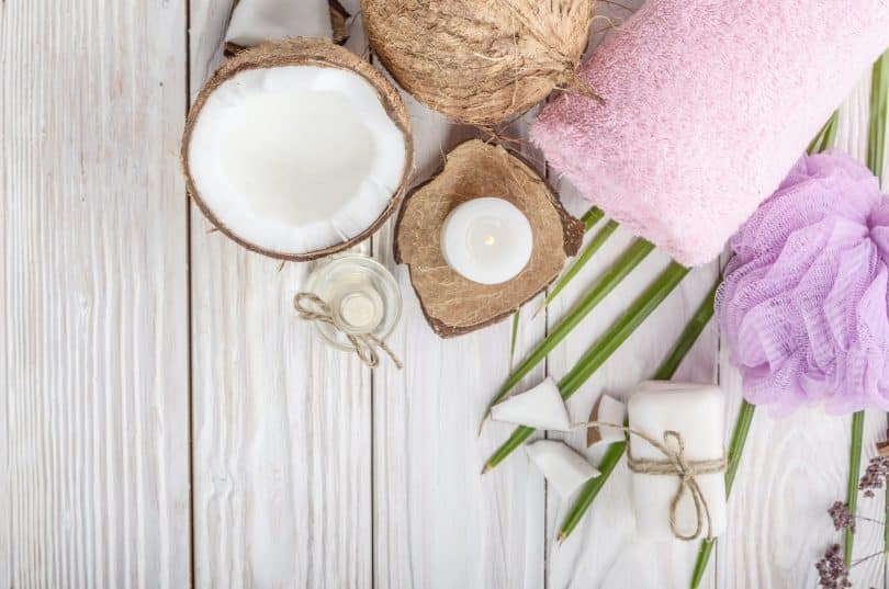 Body care Coconut oil soap and candle set on white table