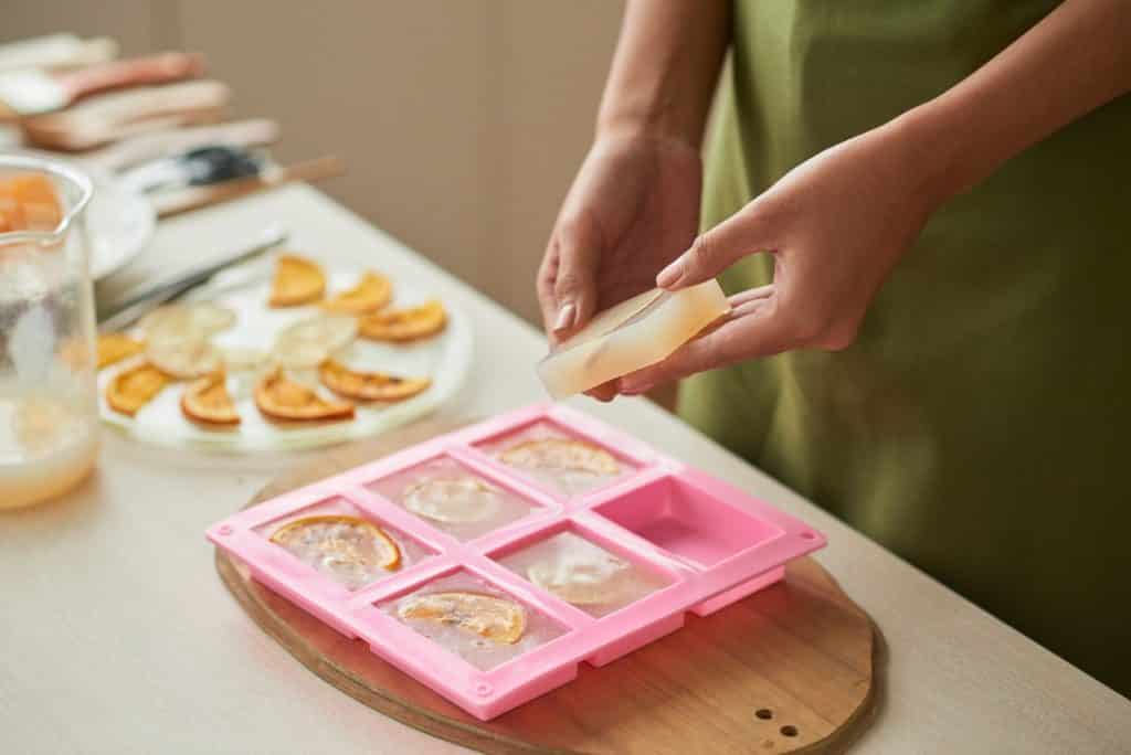 You've probably seen them at craft fairs and gift shops—those beautiful bars of soap with unique decorations. Here's how to start making your own!