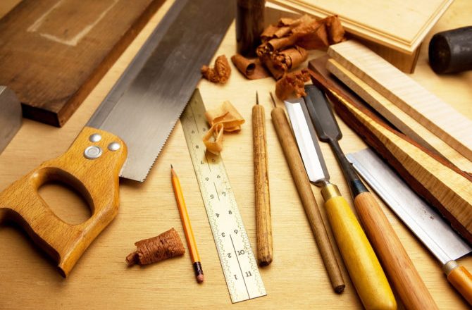 woodworking tools placed on wooden surface