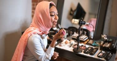 A picture of women doing makeup