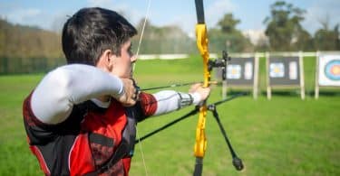 archer aiming on an archery target