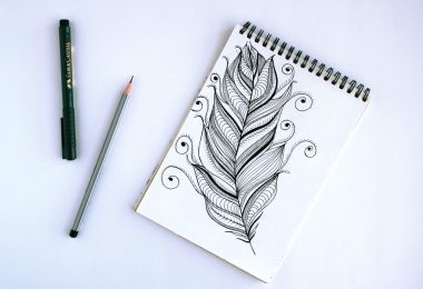 spring book with feather sketch